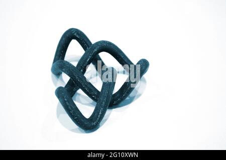 Abstract object printed by 3d printer on white background. Stock Photo