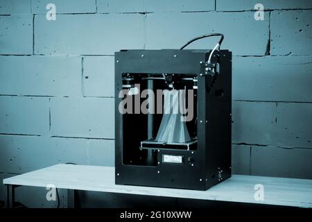 3D printer working close up. Automatic three dimensional 3d printer Stock Photo
