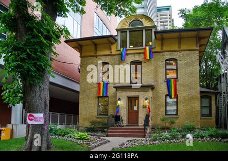 View of Canadian Gay Archives building with rainbow flags on windows Stock Photo