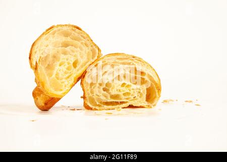Brioche plain flaky butter croissant crisp and golden in color isolated on white background Stock Photo