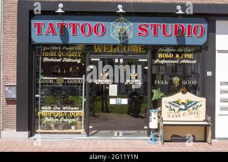 Arnhem, Netherlands - May 28, 2021: Entrance of a dutch tattoo studio Stock Photo