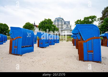 Binz, Germany. 04th June, 2021. Beach chairs stand in front of the hotel 'Hotel am Meer' on the island of Rügen at the Baltic Sea stand. One week after the opening of hotels and other hostels for local holidaymakers, tourists from all over Germany can now come to Mecklenburg-Vorpommern. Credit: Stefan Sauer/dpa/Alamy Live News Stock Photo