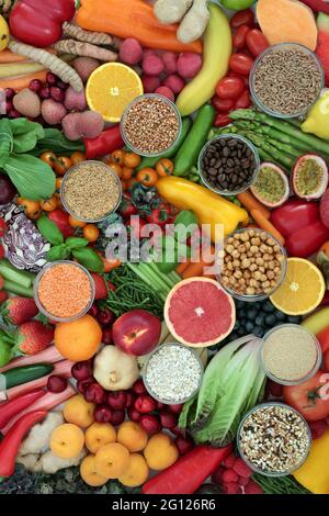 Antioxidant health food to fight free radicals with fruit, vegetables, legumes, grains, cereals, herbs and spices. Stock Photo