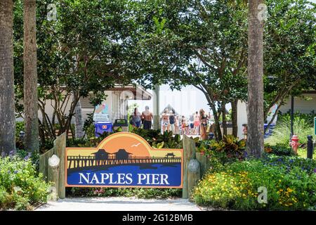 Florida Naples Gulf of Mexico Naples Pier sign entrance beach Stock Photo