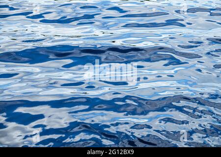 Florida FL Saint St. Lucie River water surface small waves ripples blue shades Stock Photo