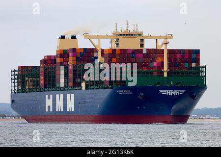 HMM Copenhagen, worlds, largest, container, ship, by, number, of ,containers, leaving, Southampton, port, The Solent, Cowes, isle of Wight, England,UK Stock Photo