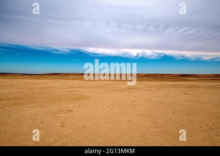 Richat Structure/Eye of Africa with layers of blue sky and clouds Stock Photo
