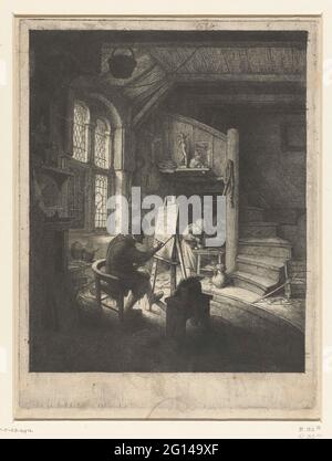 Painter in his studio. Painter working in his studio, he is behind his donkey by the window with a book on a ton next to him. Two assistants or students prepare paint at a table under a staircase. Stock Photo