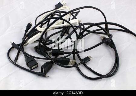 A lot of usb cables. USB cables with various types of connector. Stock Photo