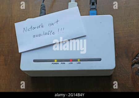 Optical network terminal. Blinking red LED indicates that network not available. Stock Photo