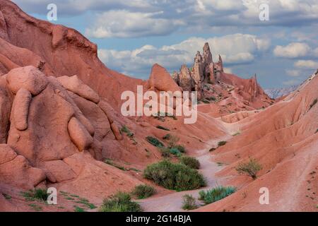 Red rock formations known as Fairy Tale Castle, in Kaji Say, Kyrgyzstan Stock Photo