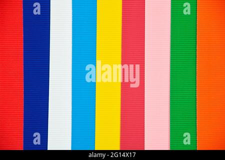 Multicolored vertical stripes of corrugated paper or cardboard. Stock Photo