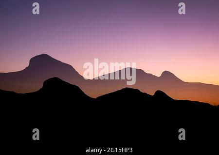 Double exposure of the Mustang Mountains south of Tombstone, Arizona, at sunset Stock Photo