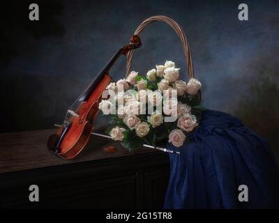 Still life with violin and bouquet of roses Stock Photo