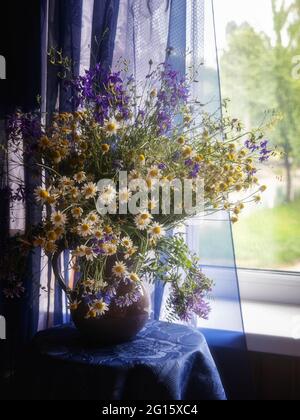 Still life with splendid bouquet of wildflowers Stock Photo - Alamy
