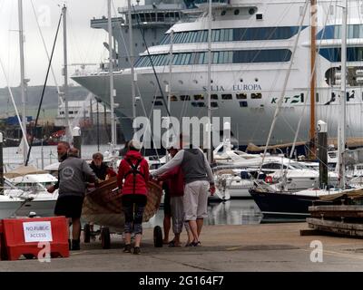 Falmouth UK, Falmouth Docks, G7 Cruise liner arrives to house 1,500 police officers of the 6,500 drafted from across the UK to Cornwall to provide security for the leaders of the seven advanced nations invited to attend. The Cruise ship MS Silja Europa is owned by Finnish operator Tallink and belongs to their Silja Line. It is one of the worlds largest Roll on roll off cruiseferrys.   5th June 2021. Credit: Robert Taylor/Alamy Live News Stock Photo