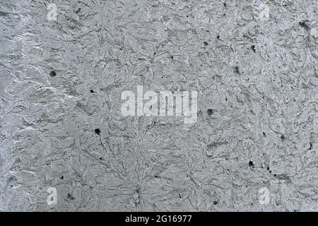 gray concrete wall with abstract cracks Stock Photo