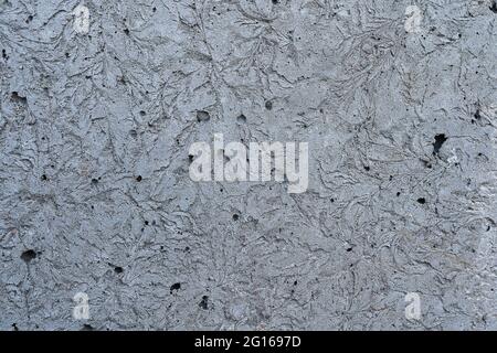 gray concrete wall with abstract cracks Stock Photo
