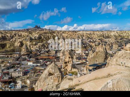 Göreme, Turkey - March 20, 2020 - beautiful panorama view of the town of Göreme in Cappadocia, Turkey with fairy chimneys, houses, and unique rock f Stock Photo