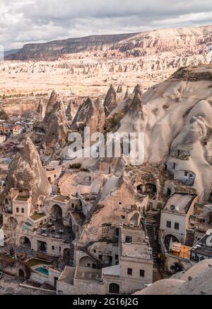 Göreme, Turkey - March 20, 2020 - beautiful panorama view of the town of Göreme in Cappadocia, Turkey with fairy chimneys, houses, and unique rock f Stock Photo