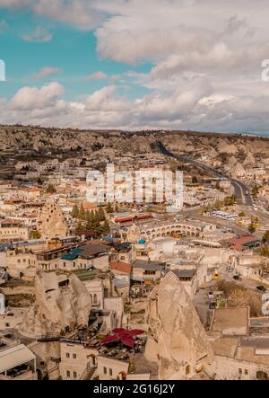 Göreme, Turkey - March 20, 2020 - beautiful panorama view of the town of Göreme in Cappadocia, Turkey with fairy chimneys, houses, and unique rock f Stock Photo