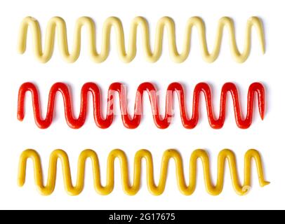Splashes of tomato ketchup, mayonnaise and mustard isolated on white background, top view Stock Photo