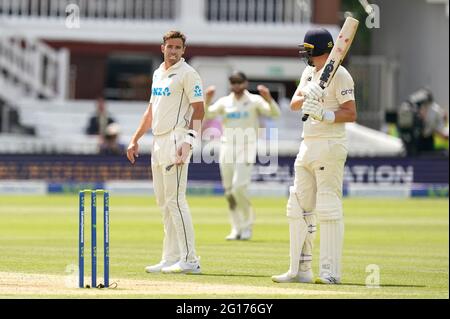 New Zealand's Tim Southee (left) and England's Ollie Robinson during day four of the first LV= Insurance Test match at Lord's, London. Picture date: Saturday June 5, 2021. Stock Photo