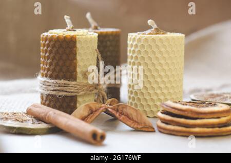 Natural handmade candles with honey aroma. Decorations for the interior. Stock Photo