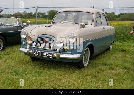 A vintage classic two tone Zephyr Zodiac at a car rally in norfolk