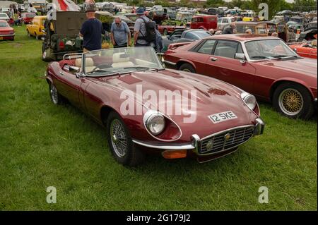 E type Jaguar V12 convertible in red at a Classic car show in Norwich Stock Photo