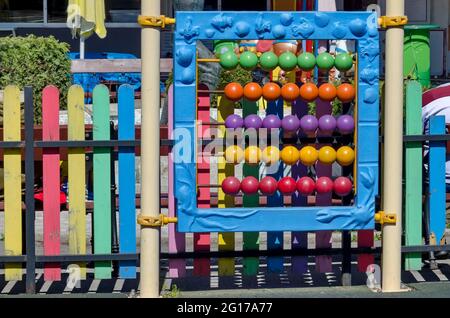 Public playground with abacus for children practicing counting with bright colored wooden beads, Sofia, Bulgaria Stock Photo