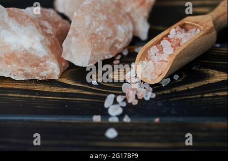 Himalayan salt on wooden background Stock Photo