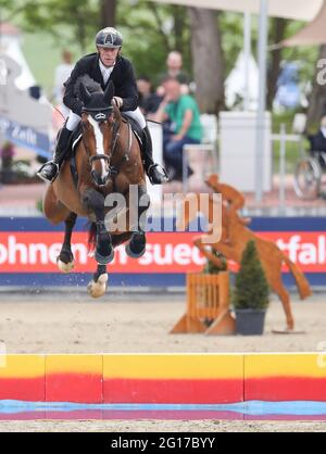 Balve, Germany. 05th June, 2021. Equestrian sport: German championship, show jumping. The show jumper Marcus Ehning rides Priam du Roset at the German Show Jumping Championships. Credit: Friso Gentsch/dpa/Alamy Live News Stock Photo