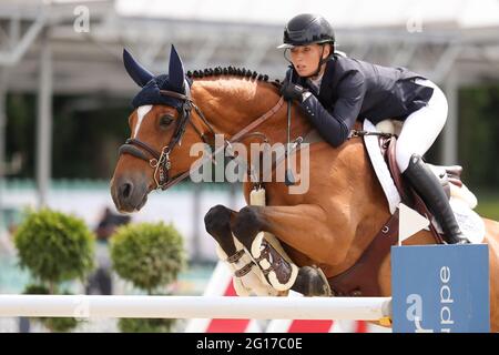 Balve, Germany. 05th June, 2021. Equestrian sport: German championship, show jumping. The show jumper Jana Wargers rides Limbridge at the German Show Jumping Championship. Credit: Friso Gentsch/dpa/Alamy Live News Stock Photo
