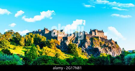 Edinburgh Castle is a historic fortress which dominates the skyline of Edinburgh, the capital city of Scotland, from its position on the Castle Rock. Stock Photo