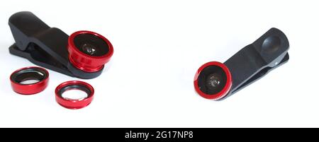 Phone lenses, mobile photography tools, different phone lenses isolated on white background. Stock Photo