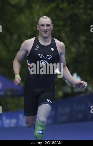 Leeds, UK. 05th June, 2021. Michael Taylor from Great Britain crosses the finishing line during the AJ Bell 2021 World Triathlon Para Series in Roundhay Park, Leeds. Credit: SPP Sport Press Photo. /Alamy Live News Stock Photo