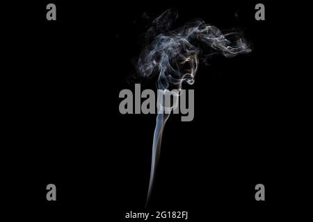 White smoke on black background Stock Photo