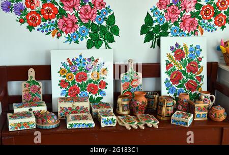 Zalipie, Poland. 05th Apr, 2021. View of hand-painted Zalipie souvenirs. The village of Zalipie is known for its custom of hand-painted huts. The characteristic floral patterns can be found on most houses in the village. Credit: SOPA Images Limited/Alamy Live News Stock Photo