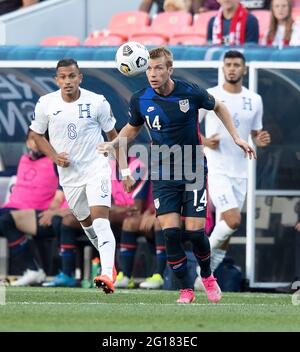 Denver, Colorado, USA. 3rd June, 2021. USA MF JACKSON YUEILL heads the ball to a team mate Wed. Night at Empower Field at Mile High. Credit: Hector Acevedo/ZUMA Wire/Alamy Live News Stock Photo