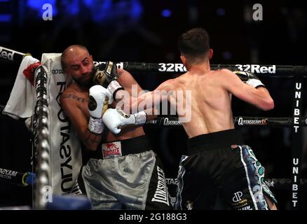 Stefan Slachev (left) and Liam Davies in the Bantamweight contest during the Boxing event at the Telford International Centre, Telford. Picture date: Saturday June 5, 2021. Stock Photo