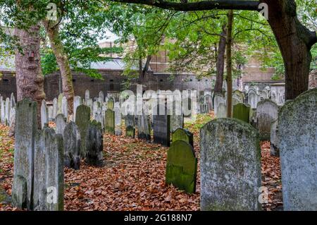 The former burial ground of Bunhill Fields in Islington, North London, is listed Grade I on the Register of Historic Parks and Gardens. Stock Photo