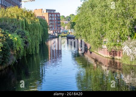 A view down the RIver Wensum in the city of  Norwich. Captured on a bright and sunny evening Stock Photo