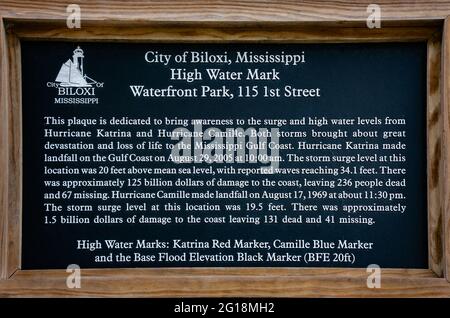 A plaque details the high water marks from Hurricanes Camille and Katrina, May 29, 2021, in Biloxi, Mississippi. Stock Photo