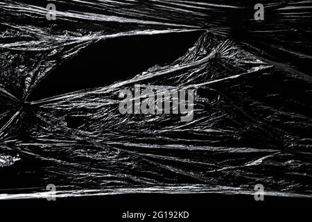 Texture of the polyethylene surface on black background Stock Photo