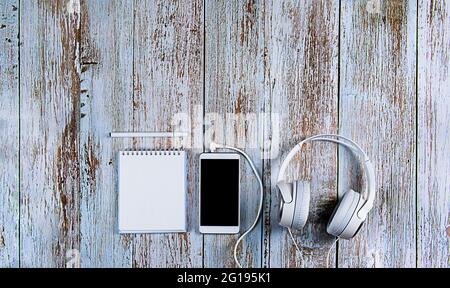 Flat layout on light blue wooden background. Horizontal photo. Composition concept online conference, desktop, office work and training Stock Photo