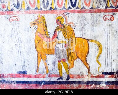 Fresco depicting a horseman Andriuolo, Tomb 114 - (330-320 BC)  - Archaeological Area of Paestum - Salerno, Italy Stock Photo