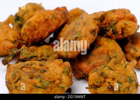 Indian snack pakora in white plate Stock Photo