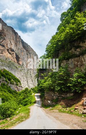 Narrow road in a mountain gorge Stock Photo