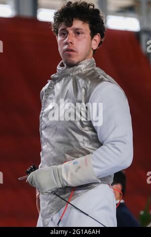 Edoardo Luperi  is an Italian fencer, in the men's foil team final during the Italian Fencing Team Absolute Championships Stock Photo